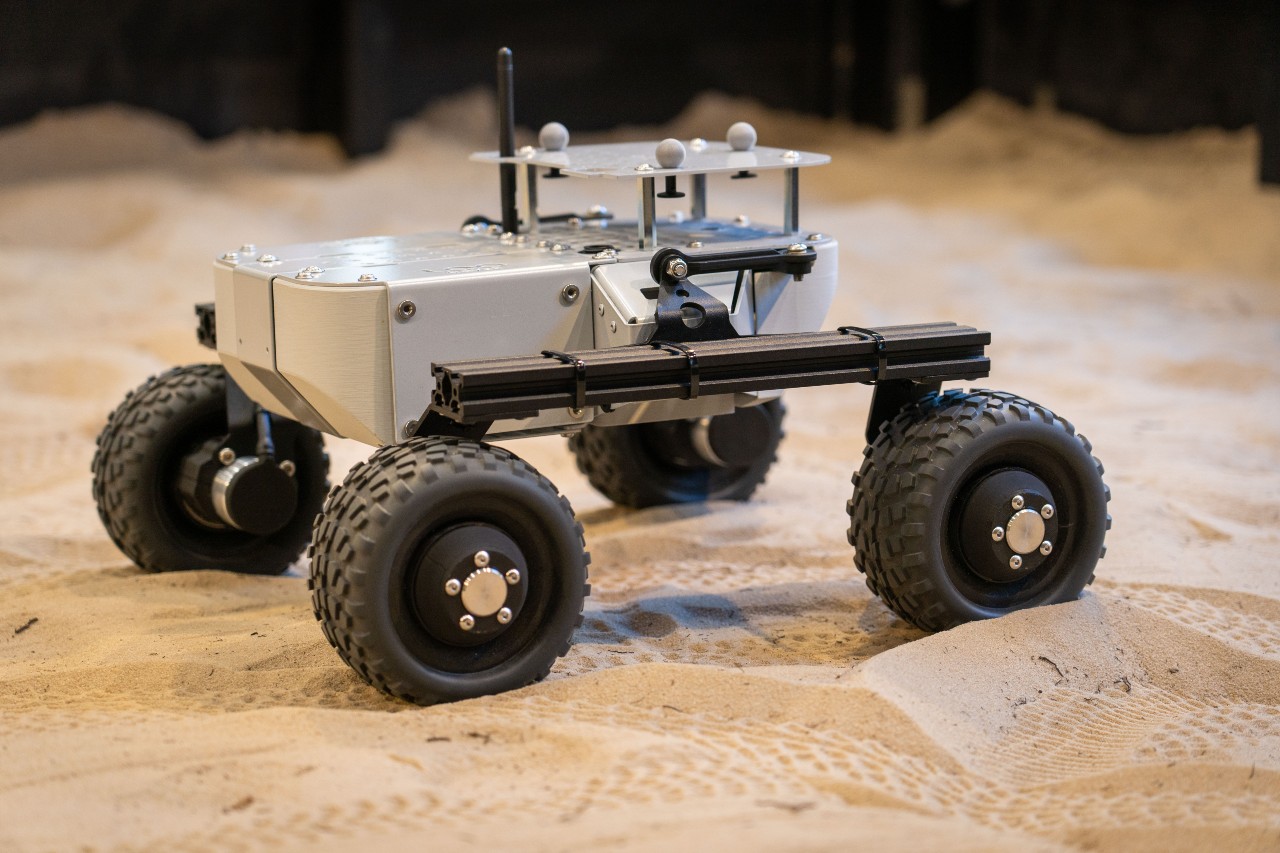 A rover on the Exterres Laboratory Surface Simulation