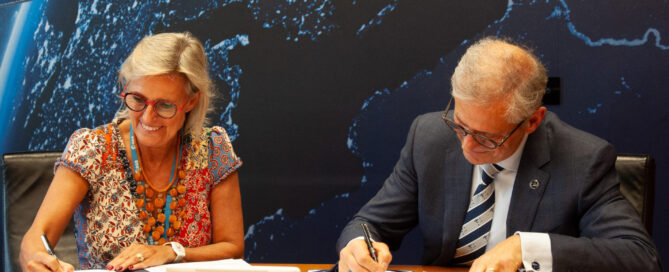 ESA Director of Earth Observation Programmes, Simonetta Cheli (left), and SmartSat CEO, Professor Andy Koronios sign the agreement to collaborate on EO technology