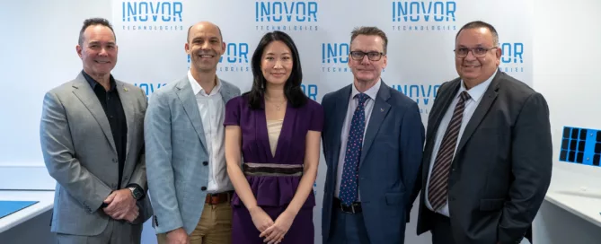 Group photo of five representatives from iLAuNCH TrailBlazer, Inovor Technologies, HEO, Optus, and Defence Science and Technology Group at the Project SWIFT partnership announcement.