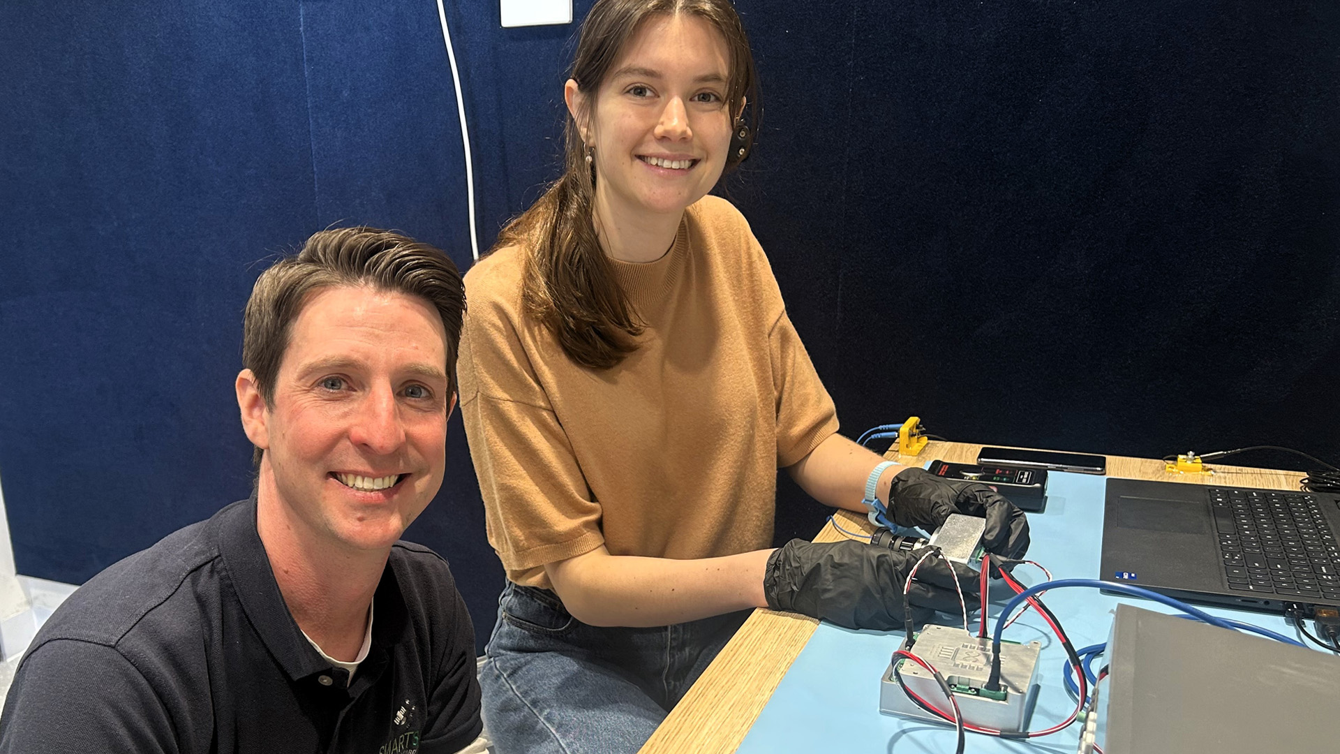 Satellite Systems Engineer Nick Manser and University of Adelaide researcher Sofia McLeod pictured in the Scarlet Lab, located at Lot Fourteen.