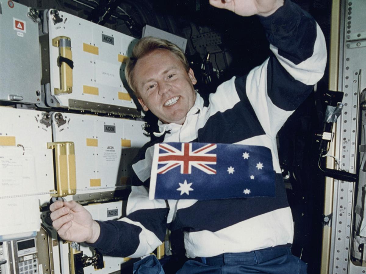 SA-born astronaut Dr Andy Thomas in a space shuttle showing the Australian flag.