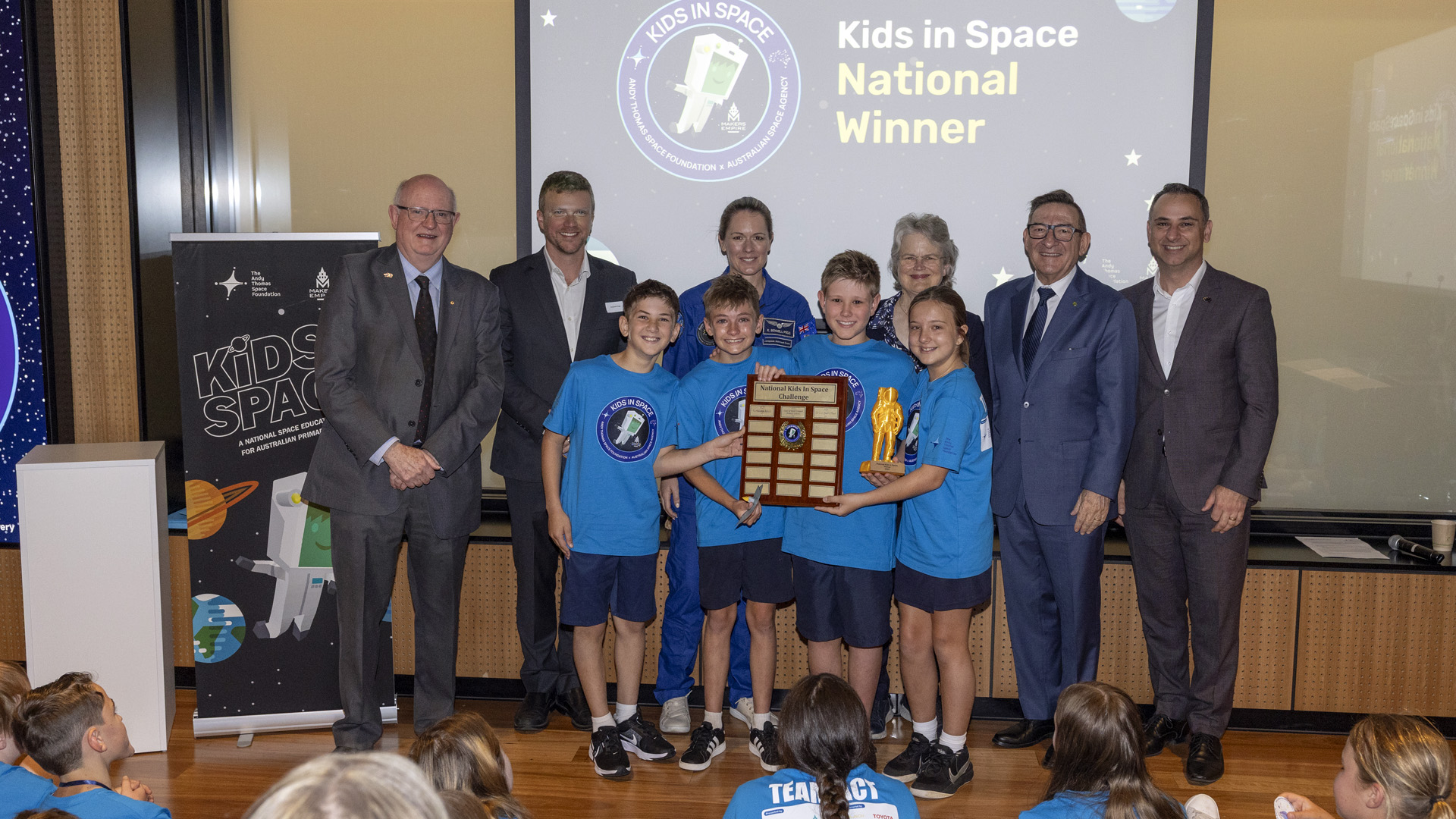 Group photo of South Australian space industry experts and school kids celebrating their win at the 2025 Kids in Space National Showcase
