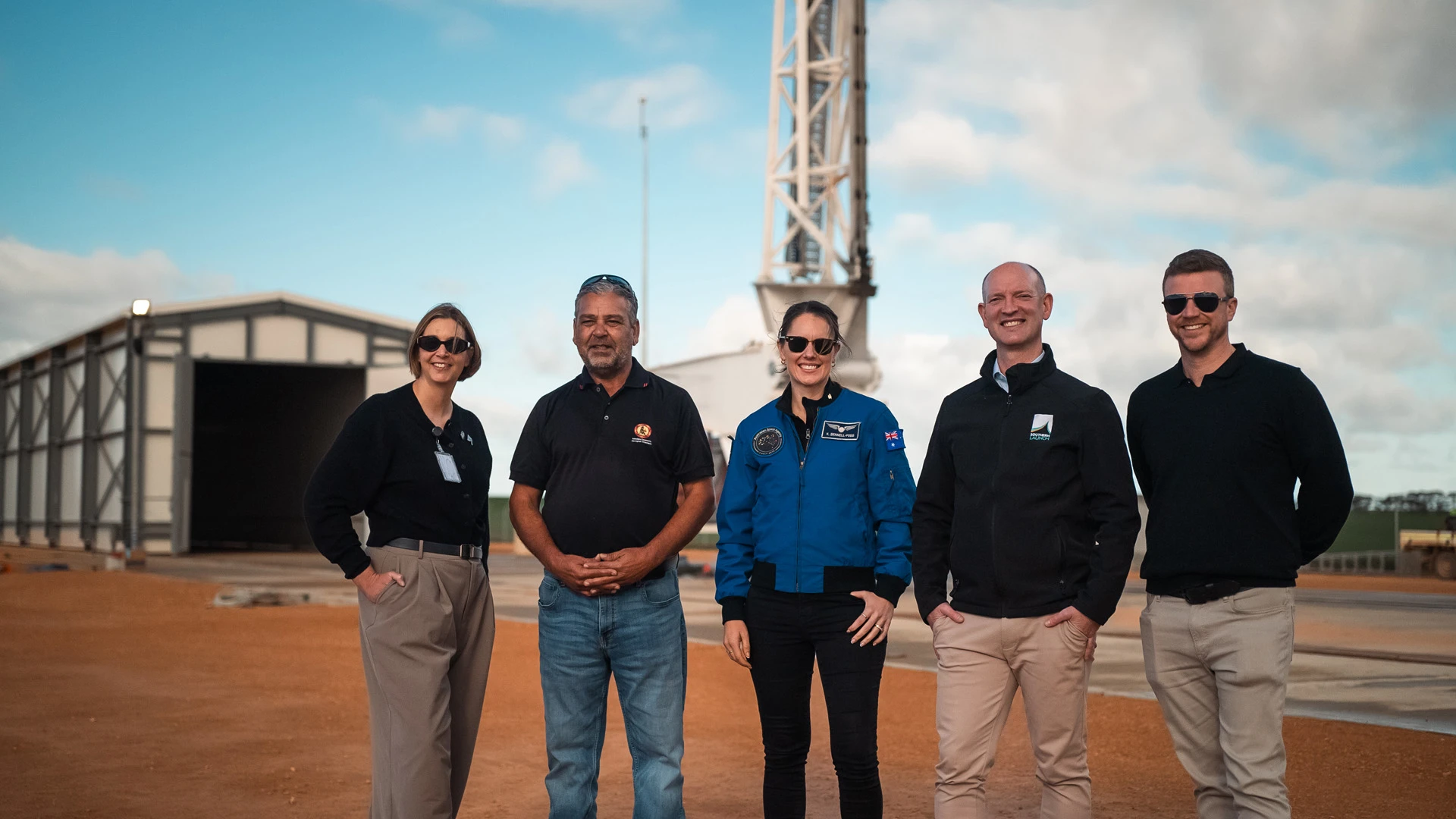 SASIC Regional Engagement Program A group of people standing on a rocket launch facility in regional South Australia