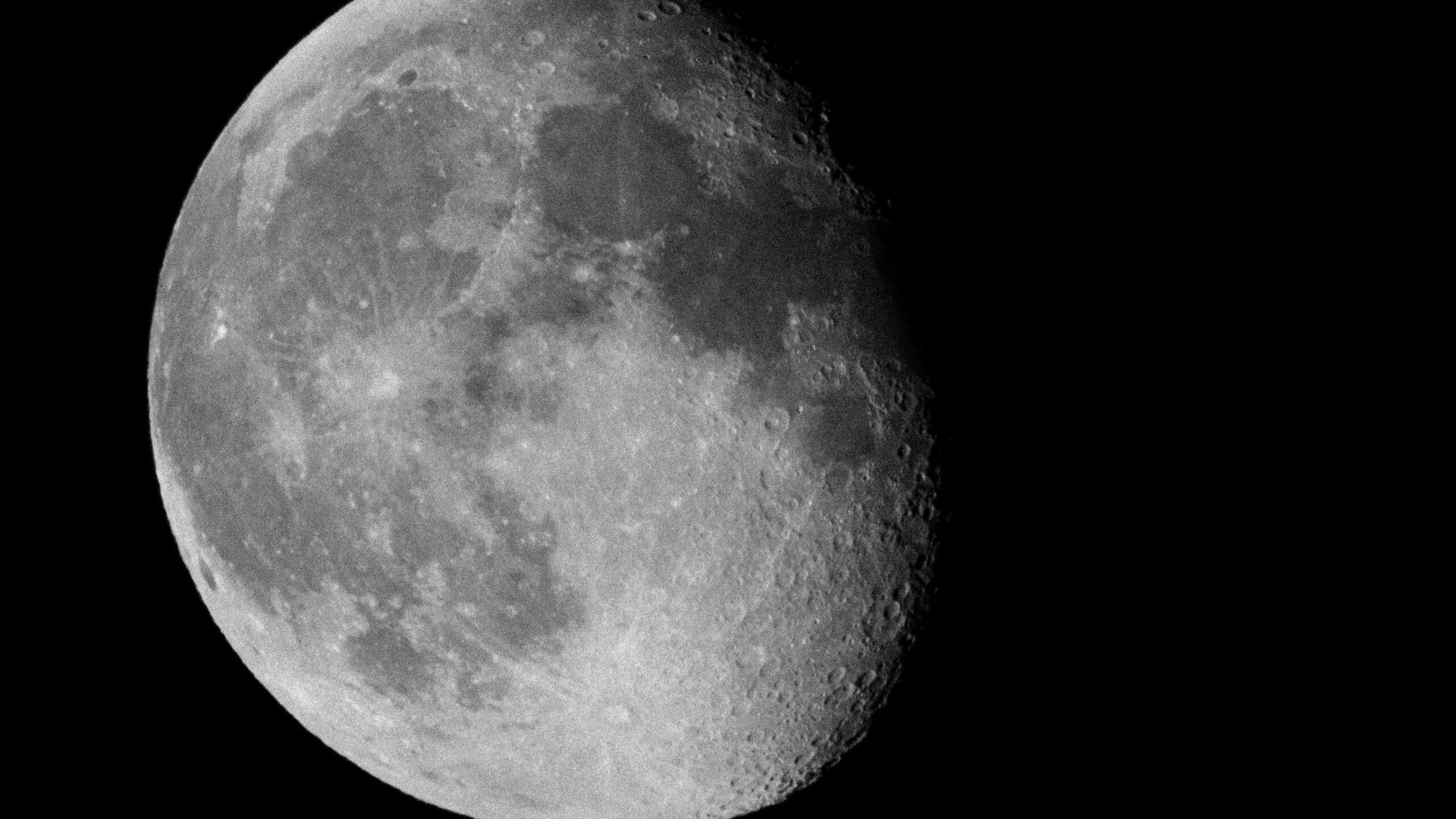 Black and white close up photo of the Moon's surface